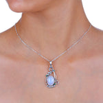 Load image into Gallery viewer, Natural Rainbow Moonstone Rainbow Cab & Emerald Cut Pendant