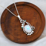 Load image into Gallery viewer, Natural Rainbow Moonstone Rainbow Cab & Emerald Cut Pendant