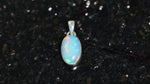 Load and play video in Gallery viewer, Natural Opal Ethiopian oval Cab Pendant