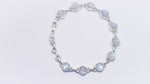 Load and play video in Gallery viewer, Natural Rainbow Moonstone Cabochon Bracelet