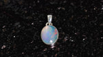 Load and play video in Gallery viewer, Natural Opal Ethiopian oval Cab Pendant