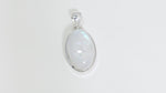 Load and play video in Gallery viewer, Natural Moonstone Rainbow Cabochon Pendant