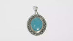Load and play video in Gallery viewer, Natural Aquamarine Cabochon Pendant