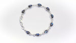Load and play video in Gallery viewer, Natural Labradorite Pear Blue Fire Cab Bracelet