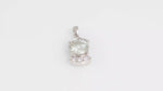 Load and play video in Gallery viewer, Aquamarine and Zircon Pendant