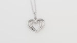 Load and play video in Gallery viewer, Double Heart Pendant (Rhodium Plated)